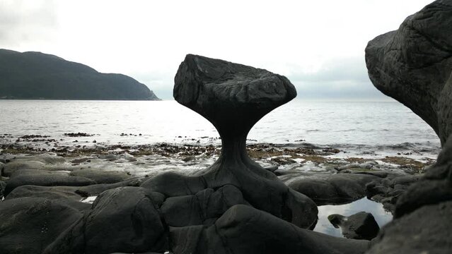 Mushroom-Shaped Rock in Norway; Kannesteinen Rock in M&aring;l&oslash;y. Still shot with Overcast