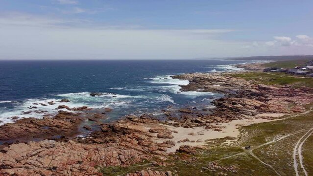 South Africa Cape St Francis summer Garden Route JBAY aerial drone cinematic drive from Still Bay George stunning beautiful late afternoon sunny rugged coastline waves seagull birds Africa forward