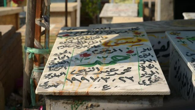 Details of graves in Wadi-al-Salaam Islamic Cemetery, Najaf in Iraq. Static view