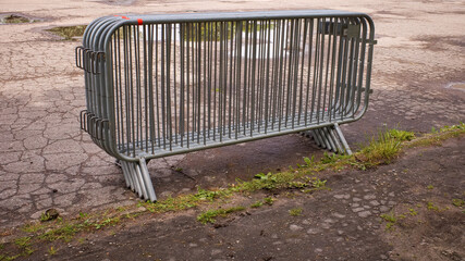 Temporary fencing. Security. Mass event. A large crowd of people. Portable sectional fence. Steel...