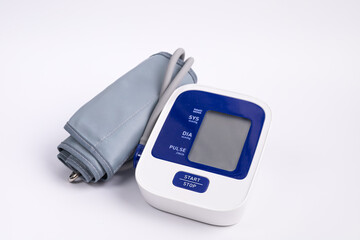Digital Blood Pressure Monitor on white. The concept of hypertension and the elderly and health care. heart rate check. healthcare and medical concept.