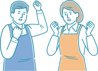 エプロン姿でポーズをとる若夫婦