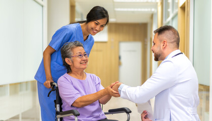 Obraz premium Man doctor with stethoscope service help support discussing and consulting care talk to sick senior asian woman patient in hospital,caregiver,elderly,recovery,illness insurance.healthcare and medicine