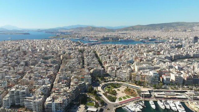 Aerial wide view of Zeas Marina with Sprawling Piraeus cityscape, Athens. Greece