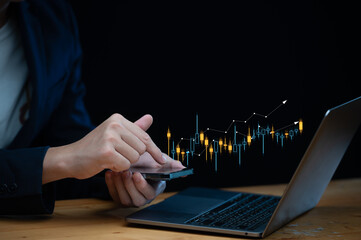 Hand of Businessman is showing a growing virtual hologram stock on smartphone, planning and strategy, Stock market, Business growth, progress or success concept. invest in trading.
