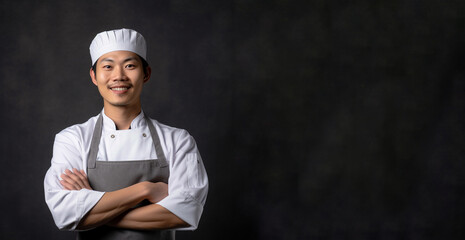 Naklejka premium a smiling young men wearing a chef clothes in dark grey background generative ai