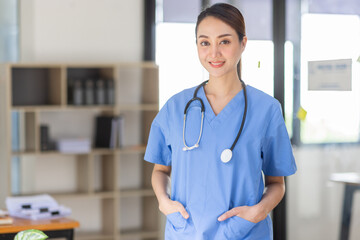 Young Asian woman nurse in clinic