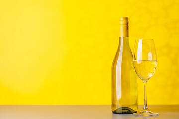 White wine bottle and wine glass