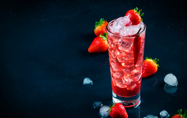 Red alcoholic cocktail drink with vodka, grapefruit juice, strawberries, sugar and hot chili...