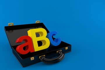 ABC text inside black briefcase