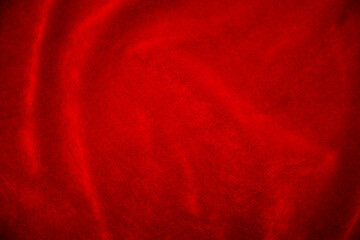 Red velvet fabric texture used as background. red fabric background of soft and smooth textile...