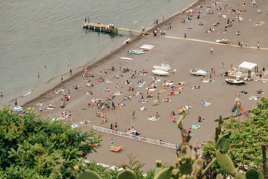 Overhead View Of Beach And Water Photo

An Overhead View Of Beach Goers Enjoying The Sun By The Water As The Tide Rolls Out