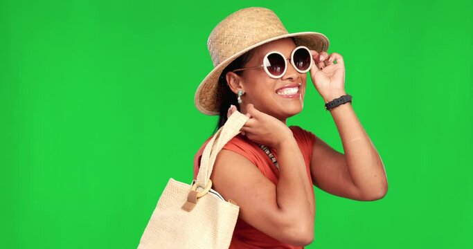 Fashion, woman and green screen in portrait on holiday with luxury for travel and happiness. Vacation, sunglasses and smile of girl with stylish clothes in summer with handbag, hat and accessories.