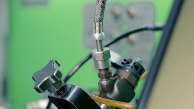 Repair of car injectors close-up. Disassembly of the nozzle and replacement of spare parts.