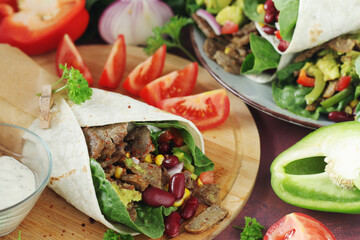 Burrito - typical Texas and Mexican cuisine wrap dish