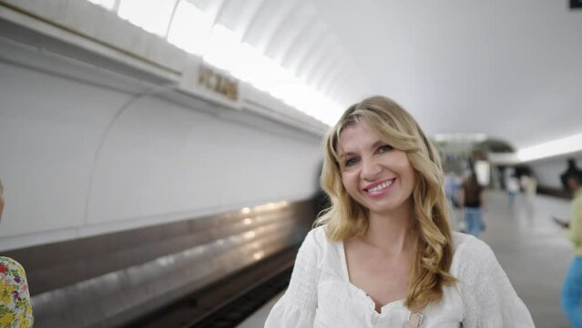 portrait of a beautiful blonde russian woman in the subway 4k