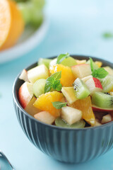 Fototapeta na wymiar A bowl with fresh fruit salad