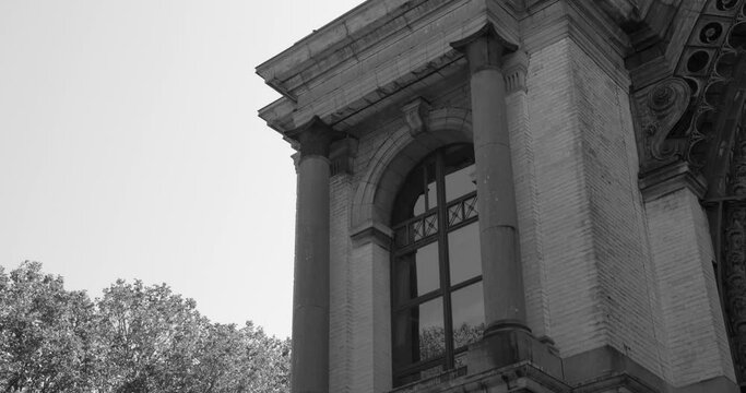 Exterior Of The Royal Museum of the Armed Forces and Military History In Parc du Cinquantenaire, Brussels, Belgium - black and white
