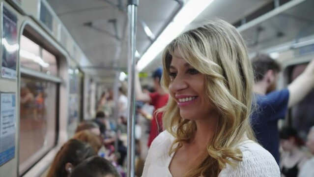 portrait of a beautiful blonde russian woman in the subway 4k