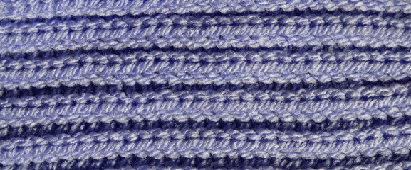 Handmade knitted fabric blue wool background texture