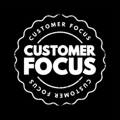 Customer Focus - strategy that puts customers at the center of business decision-making, text concept stamp
