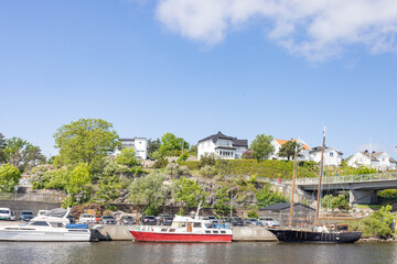 Fototapeta na wymiar Happy walking along the Glomma river in Fredrikstad om graet summer day,Norge