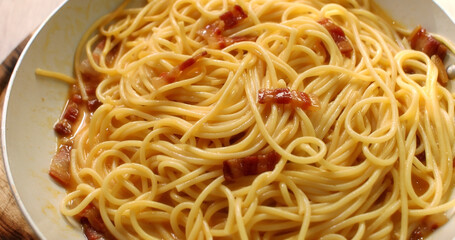 Spaghetti carbonara. Pasta with pancetta, egg, parmesan cheese. Traditional italian cuisine. Pasta alla carbonara.