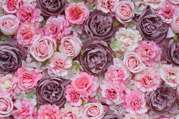 Rose flower background material produced with artificial flowers.