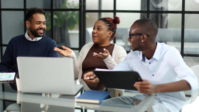 Three African Business People In The Office