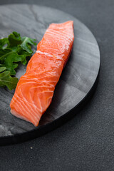 fresh salmon raw piece of fish seafood healthy meal food snack on the table copy space food background rustic top view pescatarian diet