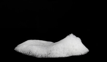 liquid white foam from soap or shampoo or shower gel Abstract soap bubbles. Set foam, soap bubble isolated on black, with clipping path texture and background.	
