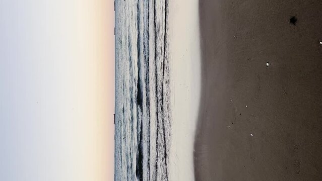 Baltic sea Dark blue clouds and sea or ocean water surface with foam waves before storm, dramatic seascape background. Incredible sunsets. Abstract natural pattern texture.