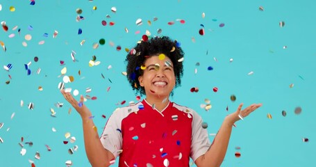 Celebration confetti, applause and woman excited for studio bonus, winning reward or prize giveaway. Success happiness, winner achievement and person clapping, celebrate or smile on blue background