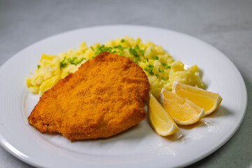 Chicken cutlet with couscous and lemon