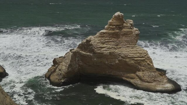 waves crushing ashore in the Paracas national park