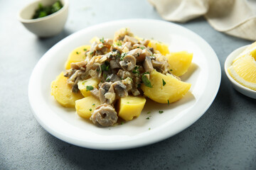 Boiled potato with mushroom ragout