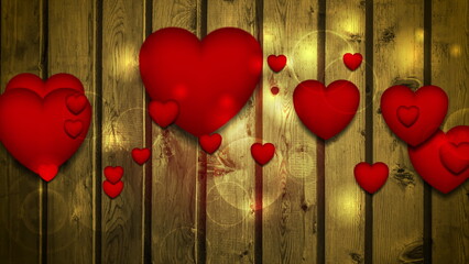 Red moving hearts on brown wooden texture background