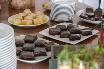 Various desserts served in a buffet line
