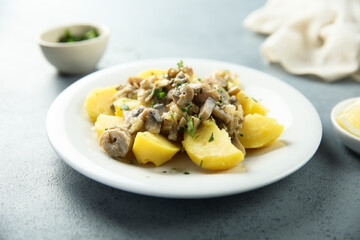 Boiled potato with mushroom ragout
