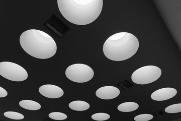Ceiling with round skylight portals, abstract minimal architecture