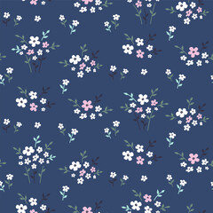 Seamless pattern with white and pink flowers and leaves on navy background. Floral print