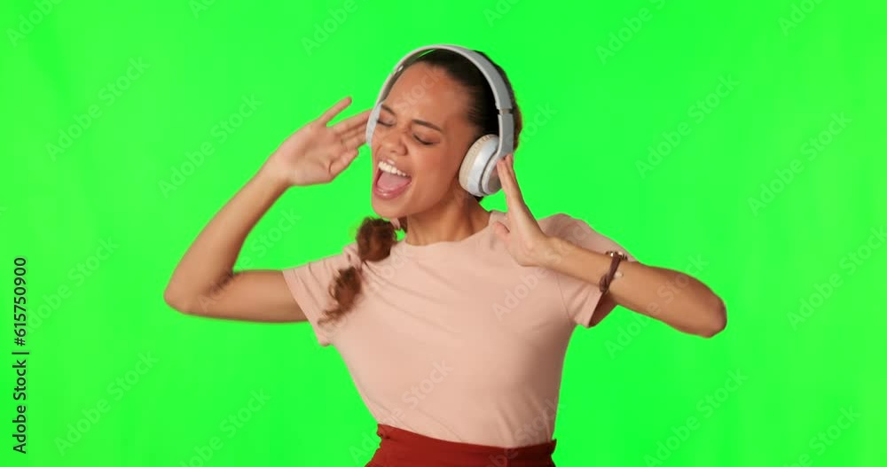 Sticker Headphones, dance and woman on green screen for rock music, energy and singing with youth streaming service. Listening, dancing and excited person with gen z audio or technology on studio background