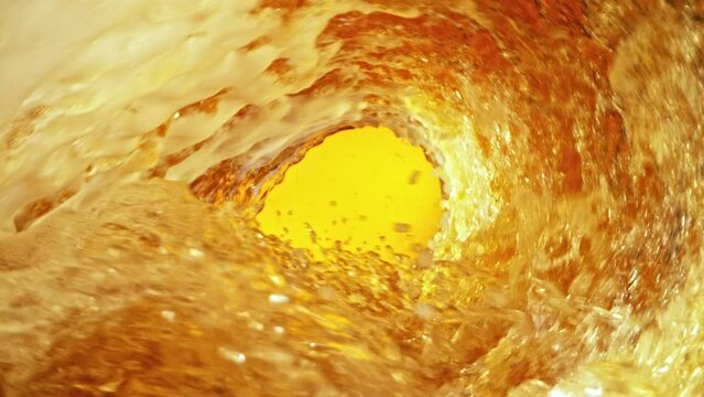Super Slow Motion of Splashing Beer Wave Creating Tunnel Shape. Filmed on High Speed Cinema Camera, 1000 fps.
