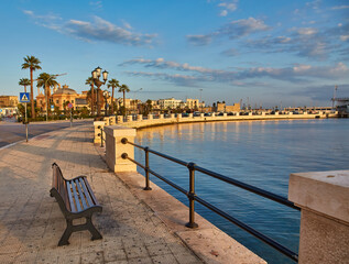 view of Bari, Southern Italy, the region of Puglia, Apulia seafront at dusk. Basilica San Nicola in the background.