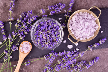 Lavender bath salt with fresh lavender flowers. Flat lay.
