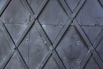 Obraz premium Metallic door with rhombus shape texture background