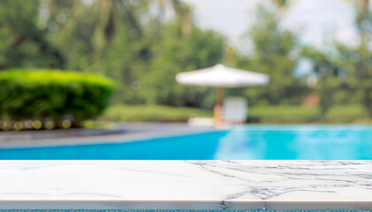 Empty white marble stone table top and blurred swimming pool in tropical resort in summer banner background - can used for display or montage your products.