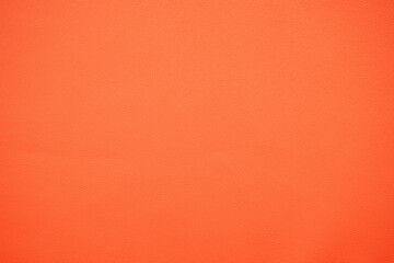 Texture of orange color leather sheet 