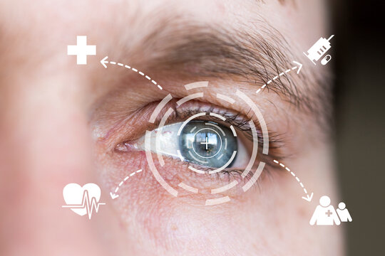 Eye monitoring and treatment in healthcare. Biometric scan of male eye on virtual panel.