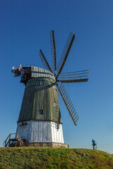 Fototapeta premium windmill dutch type against blue sky